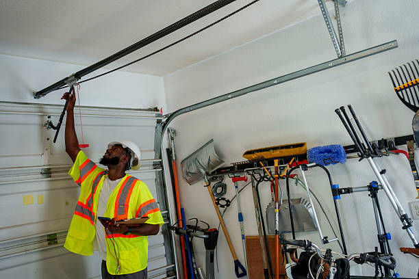 Professional Garage Door technician working in Benld, IL